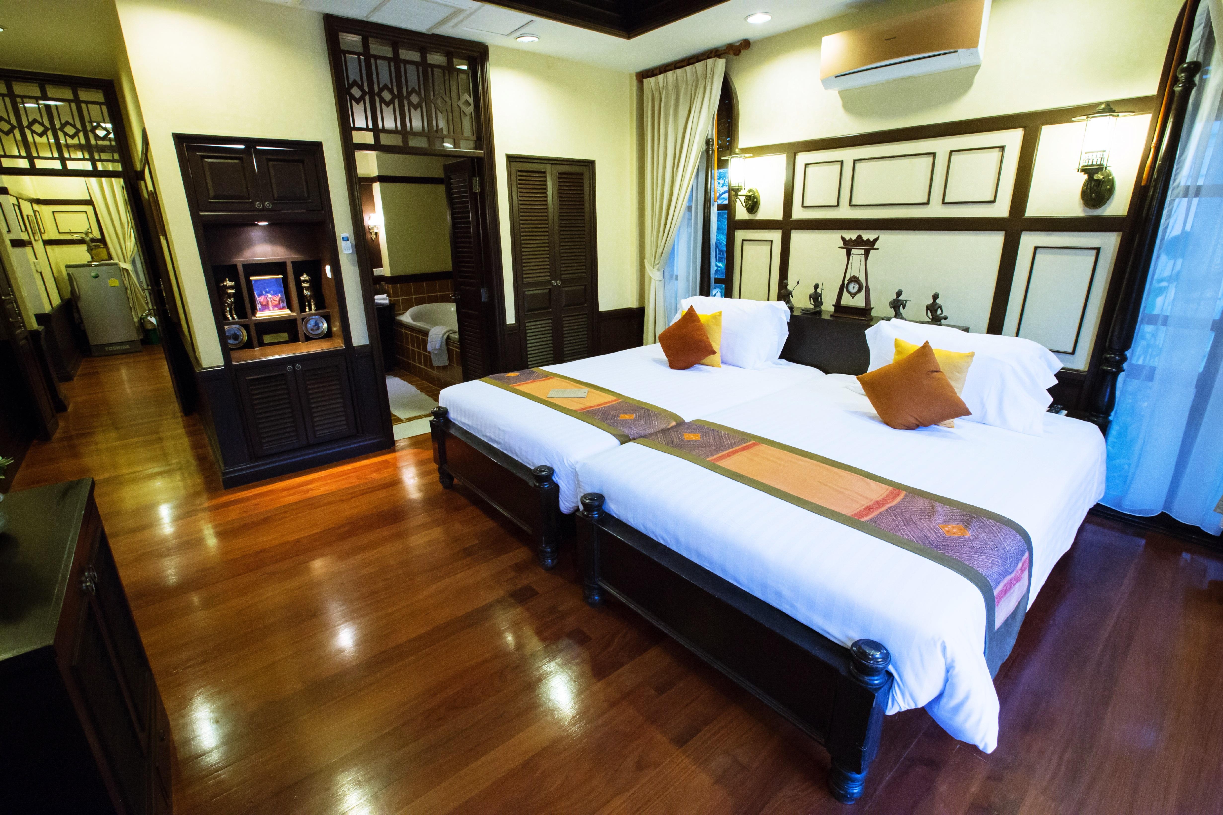 منتجع وسبا ورا بورا هوا هين المظهر الخارجي الصورة A bedroom at the Riverview Suite
